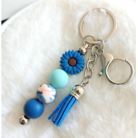Sleutelhanger met kralen en kwastje | blauw | bloem