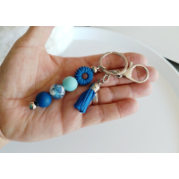 Sleutelhanger met kralen en kwastje | blauw | bloem