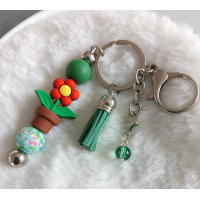 Sleutelhanger met kralen en kwastje | groen & rood | bloem