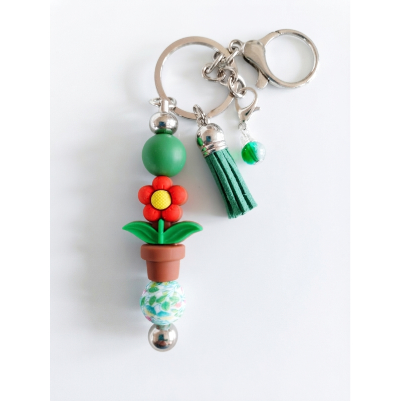 Sleutelhanger met kralen en kwastje | groen & rood | bloem