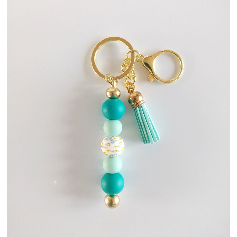 Sleutelhanger met kralen en kwastje | teal, aqua | goudkleurig