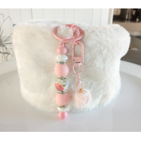 Sleutelhanger met kralen en fluffy bolletje | roze