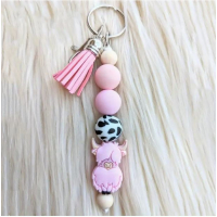Sleutelhanger met roze koe