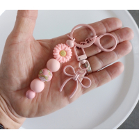 Sleutelhanger met kralen | roze | bloem | strik