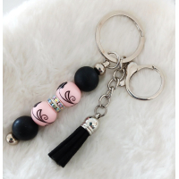Sleutelhanger met kralen en kwastje | zwart, roze | roos