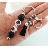 Sleutelhanger met kralen en kwastje | zwart, roze | roos