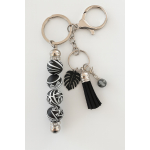 Sleutelhanger | zwart, wit | 3 bedels| kwastje | tribal